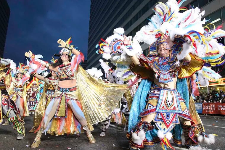 Pennsport – Egyptians “Mummies in De Nile”String Band captain Charlie Nicholas, right, perform during the 113th annual Mummers Parade in Philadelphia, Tuesday, January 1, 2013.