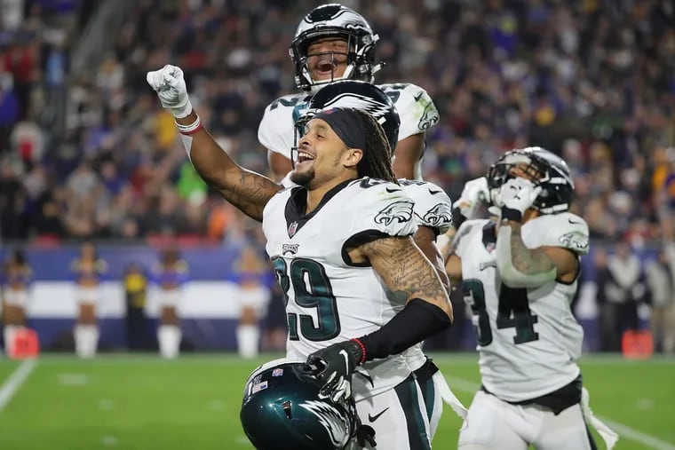 Eagles free safety Avonte Maddox, left, celebrates after intercepting a pass in the 2nd quarter as the Philadelphia Eagles play the Los Angeles Rams in Los Angeles, CA on December 16, 2018.