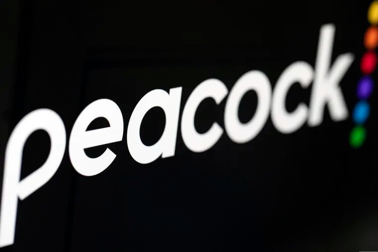 In this Jan. 16, 2020 file photo, the logo for NBCUniversal's upcoming streaming service, Peacock, is displayed on a computer screen in New York.  (AP Photo/Jenny Kane, File)