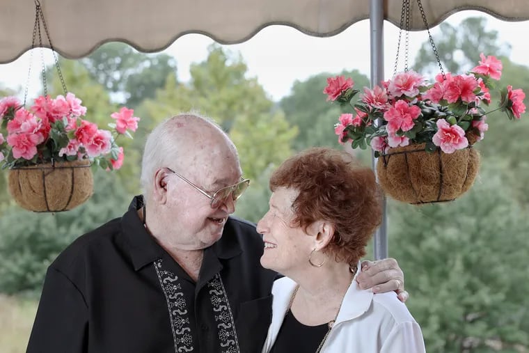 Gary Mooney (left) and his wife, Carmela Patterson-Mooney, at their home in Media, Pa., on Wednesday, Sept. 2, 2020. The couple married in February.