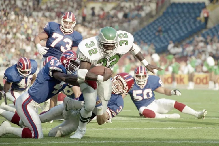Philadelphia Eagles running back James Joseph breaks away from several Buffalo Bills players during a preseason game in July 1991, the last time the Birds played in London.
