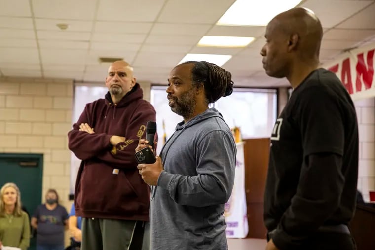 Lee Horton, 56, speaks in front of fellow Fetterman supporters along side his brother Dennis Horton, 52, (right), during a meet and greet at UFCW Local 1776 Headquarters in Plymouth Meeting on April 16. The Horton brothers, from North Philadelphia, were convicted together for participating in a 1993 robbery and murder. Their life sentences were commuted by the Board of Pardons in December 2020. Lee Horton will accompany Fetterman to the State of the Union address Tuesday.