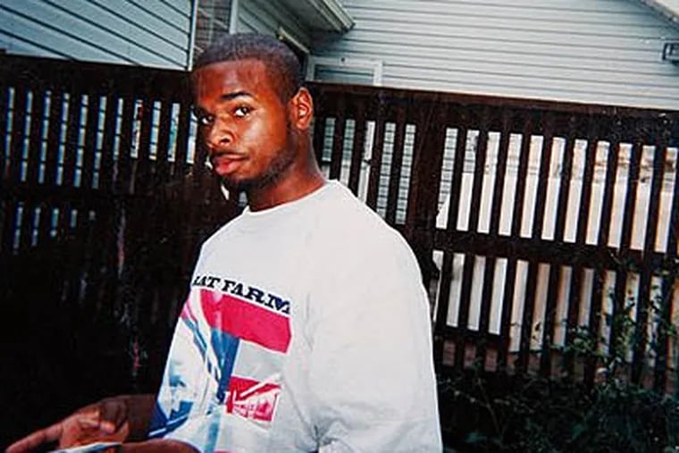 This 2002 photo provided by Roman Castro shows Sharif Mobley, 26, at a barbecue in Buena, N.J. The FBI confirmed Thursday, March 11, 2010 that the agency is looking into the case of 26-year-old son, Sharif Mobley, who grew up in Buena and is an alleged al-Qaida member raised in New Jersey who is accused of trying to shoot his way out of a hospital in Yemen. (AP Photo/Roman Castro)