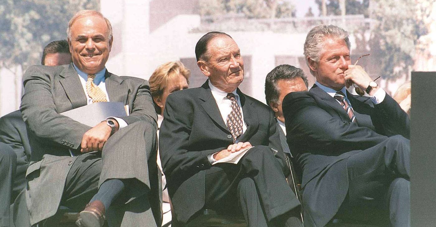 Bogle with Ed Rendell (left) and President Bill Clinton (right) in Philadelphia about 20 years ago. He said of the economy: "The disparity in income is deeply regrettable. I don't know what we do about it exactly."