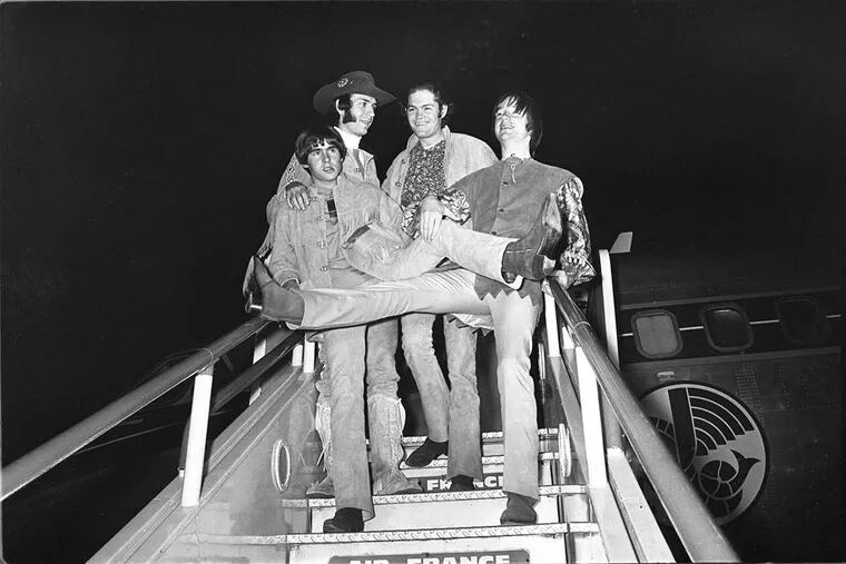 American pop group, the Monkees, pictured on arrival at London Airport, 28th June, 1967. Arriving from Paris, the group will perform a live stage show at the Empire Pool, Wembley, this coming weekend. Left to right are Davy Jones, Peter Tork, Micky Dolenz and Mike Nezsmith. (AP photo).