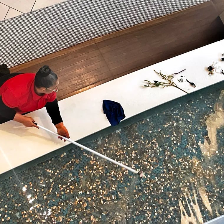 Shoppers “donate” other objects besides coins in a fountain at the Cherry Hill Mall, leaving maintenance workers to clean up after them (the coins go to charity).