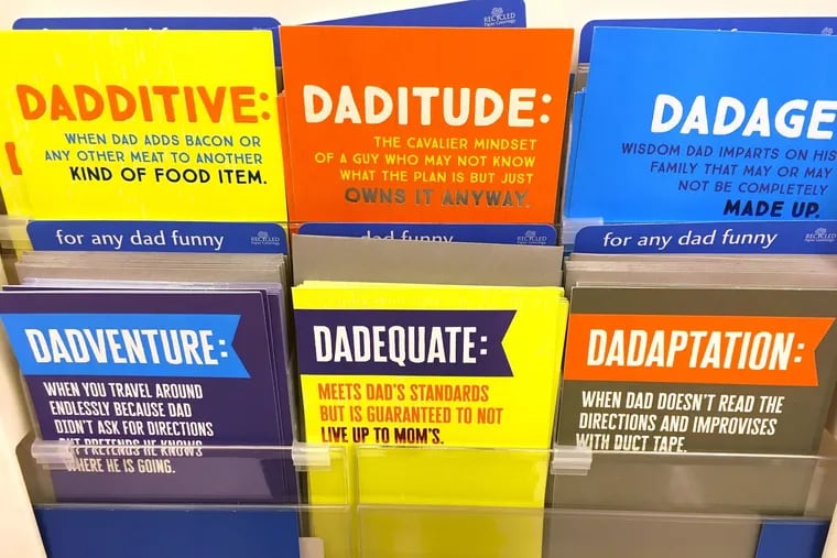 Father's Day cards, like these on sale at Target in West Philadelphia, are billed as funny but perpetuate sexist stereotypes about dads.
