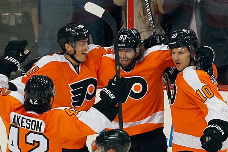 The Flyers celebrate after Jake Voracek's goal against the Rangers. (Ron Cortes/Staff Photographer)