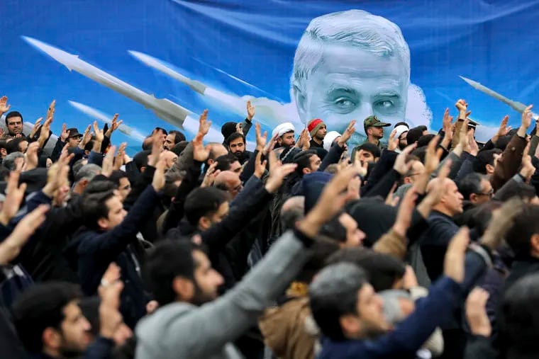 Protesters demonstrate over the U.S. airstrike in Iraq that killed Iranian Revolutionary Guard Gen. Qassem Soleimani in Tehran, Iran.