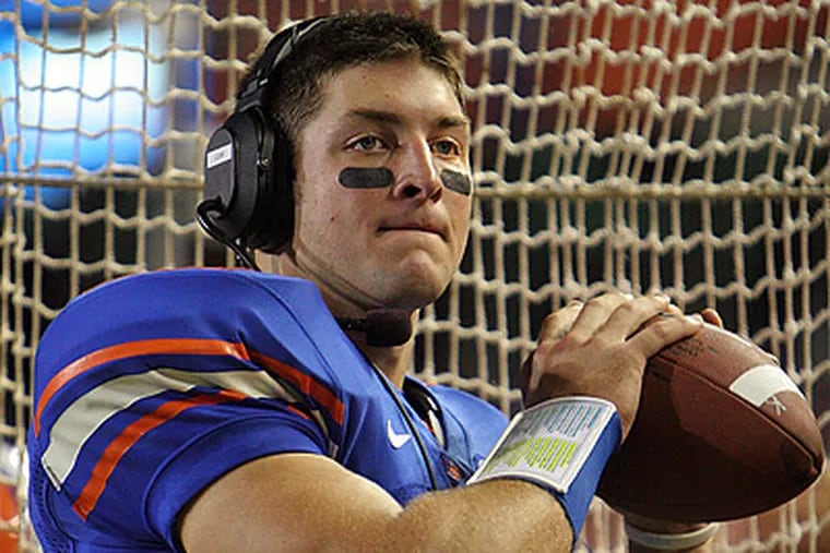 Florida football quarterback Tim Tebow was rumored to have drawn interest from the Eagles. (AP Photo / Tim Casey)