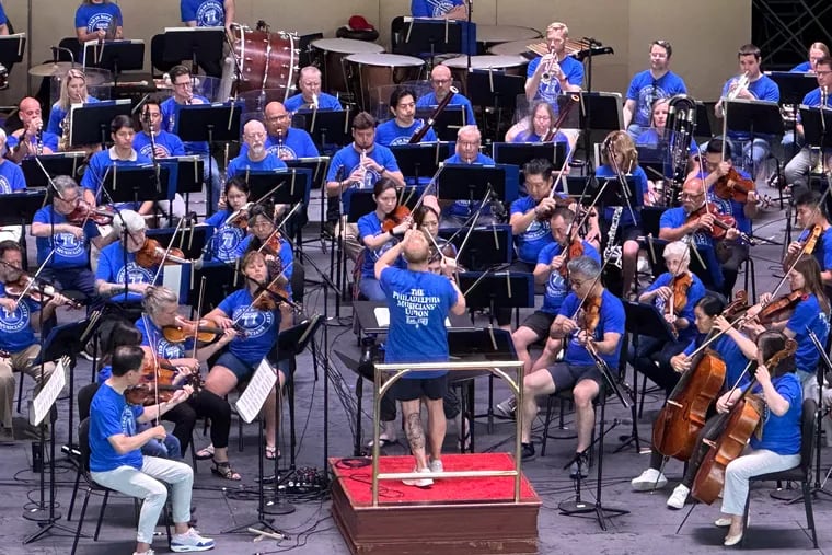 Philadelphia Orchestra music and artistic director Yannick Nézet-Séguin wears a blue musicians' union T-shirt in solidarity with his orchestra members during an open rehearsal in Saratoga Springs, N.Y. in August. The musicians, represented by The Philadelphia Musicians' Union, Local 77 of the American Federation of Musicians, are in negotiations for a new contract with the Philadelphia Orchestra and Kimmel Center Inc.