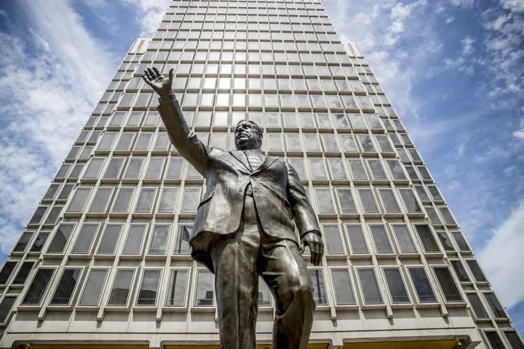 The statue of former mayor Frank Rizzo stands in the Thomas Paine Plaza in front of the Municipal Services Building, across from City Hall. There is now a movement to have the statue removed to a different location.