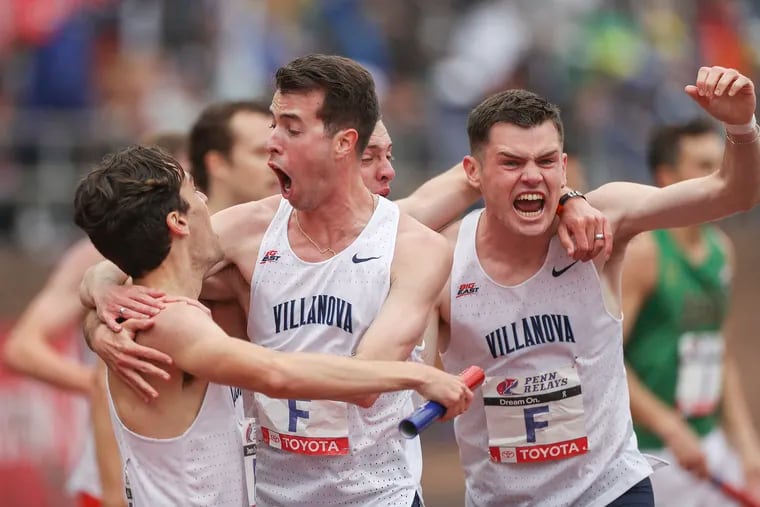 Villanova celebrates finishing first in the College Men's 4xMile Championship of America race on the third and final day of the 2023 Penn Relays at Franklin Field in Philadelphia on Saturday, April 29, 2023.