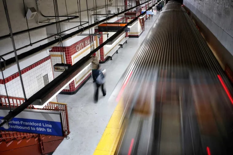 A SEPTA Broad Street line train leaves City Hall station Monday after the strike was settled.
