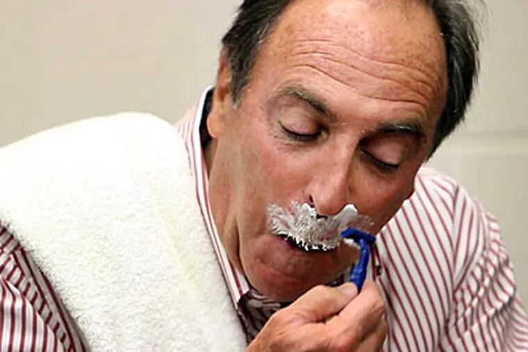 Temple coach Fran Dunphy shaved his mustache after losing a bet with former player Dionte Christmas. (Laurence Kesterson/Staff Photographer)