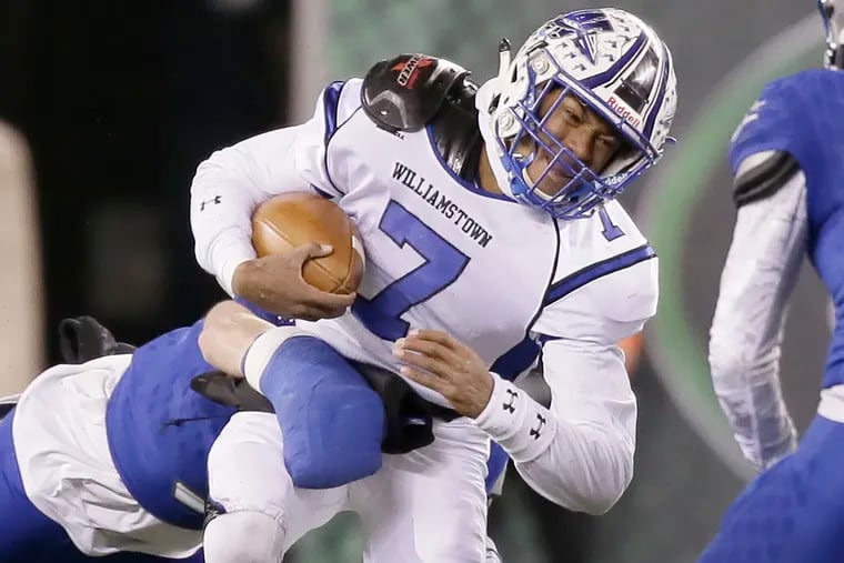 Williamstown quarterback J.C. Collins runs for yardage in firts half of South/Central Bowl Game vs. Sayreville.