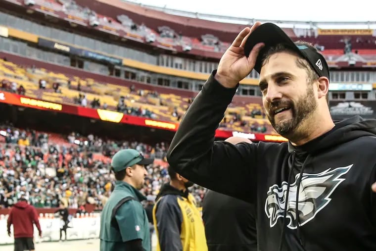 Philadelphia Eagles head coach Nick Sirianni tips his hat to fans after his team beat Washington 20-16 at FedEx Field in North Englewood, MD, Sunday, January 2, 2022.