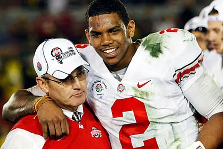 Terrelle Pryor (right) will most likely make himself available for an NFL supplemental draft. (Mark J. Terrill/AP file photo)