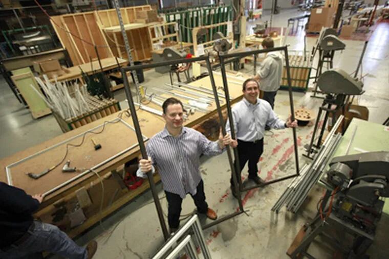 John Siegel and Jay Reyher (right) of Quanta Technologies, Inc., of Lancaster. (David Swanson / Staff Photographer)