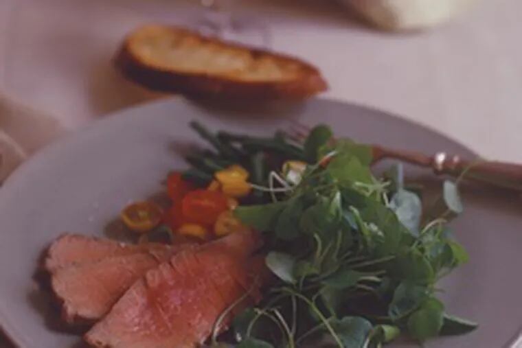 Seared tuna is paired with watercress, green beans and tomatoes. Meats and cheeses also are options.