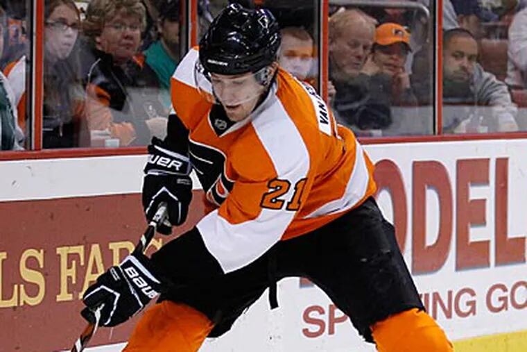 "I wish it was up to me," Flyers winger James van Riemsdyk said of returning to the ice. (Matt Slocum/AP file photo)