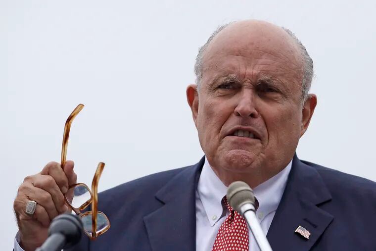 In this Aug. 1, 2018, file photo, Rudy Giuliani, an attorney for President Donald Trump, speaks in Portsmouth, N.H.