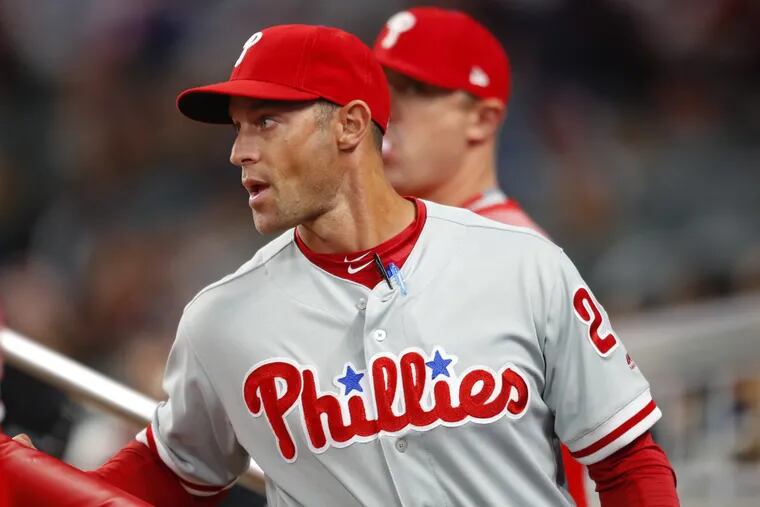 Phillies manager Gabe Kapler returning to the dugout after a pitching change against the Braves on Saturday.