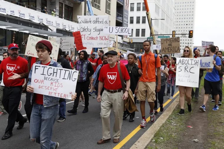 Teachers marching down North Broad Street in May during a demonstration for a fair contract. Philadelphia teachers approved a new deal in June.