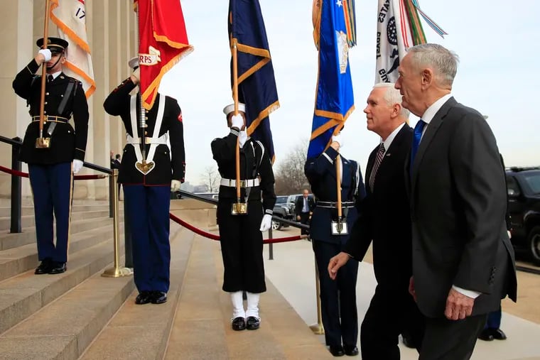 Defense Secretary Jim Mattis welcomes Vice President Pence to the Pentagon, Wednesday, Dec. 19, 2018.