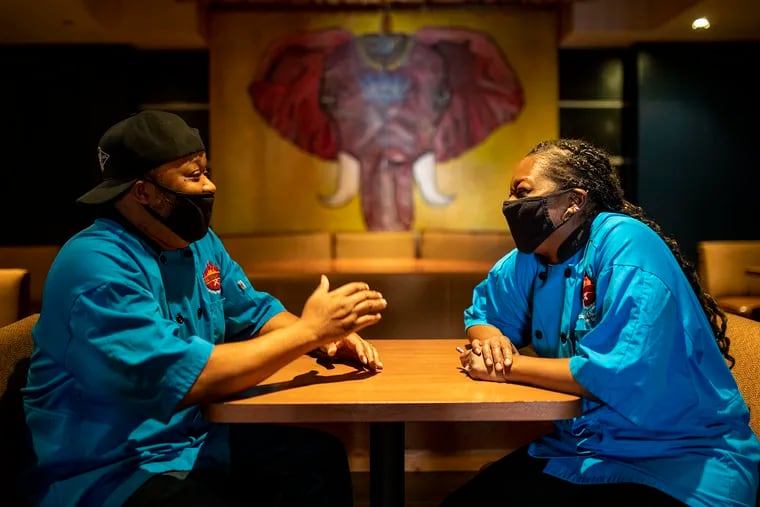 Sean Green and Nikeah Green between takeout orders at their new restaurant, BBQ Unlimited, 246 Market St.