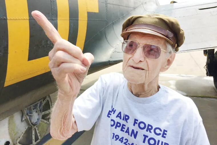Standing next to a B-17 Flying Fortress at Northeast Airport, former ball turret gunner Joe Blinebury, 95, recounts his experiences in the flak-filled skies of Europe during World War II. STU BYKOFSKY / DAILY NEWS STAFF