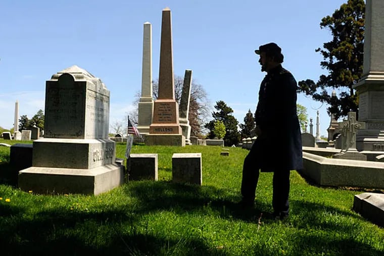 Andy Waskie, a historian and Temple professor, stands at the grave of Samuel W. Crawford at Laurel Hill Cemetery in East Falls. Crawford was a Union general and surgeon who served at Gettysburg and Antietam.
