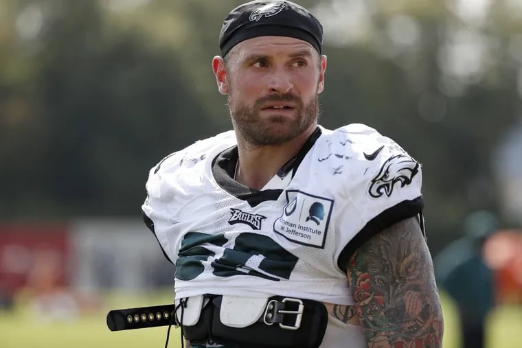 Eagles’ Chris Long pauses at the end of Eagles training camp in Philadelphia, PA on August 2.