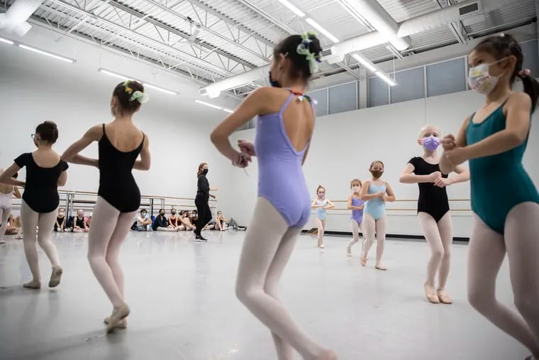 Children rehearse for Philadelphia Ballet's "Nutcracker." Everyone is wearing a mask for class and rehearsal but will unmask for performances.