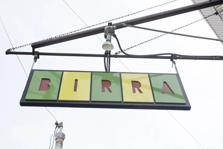 The sign outside of Birra. ( Colin Kerrigan / Philly.com )