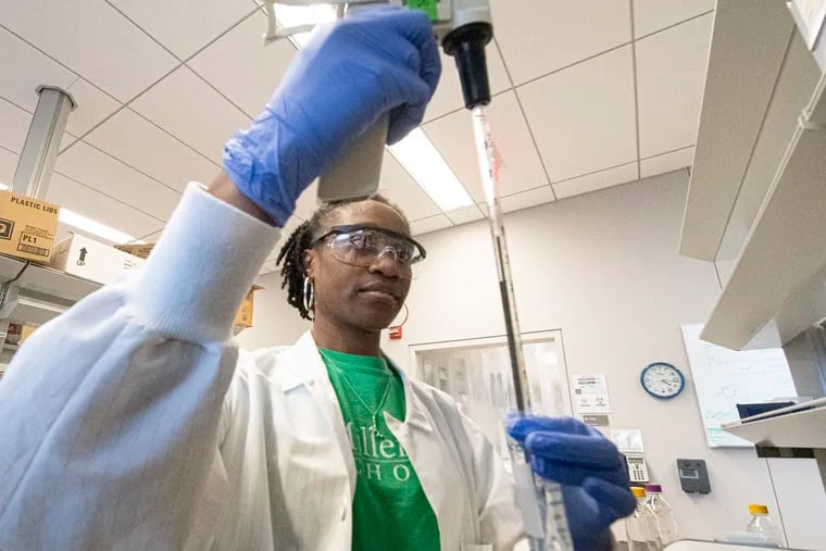 Senior Ashley Saunders, works in a lab at Penn State. The university for the last seven years has run one of few programs nationally to get more women and minority students into graduate programs in STEM.