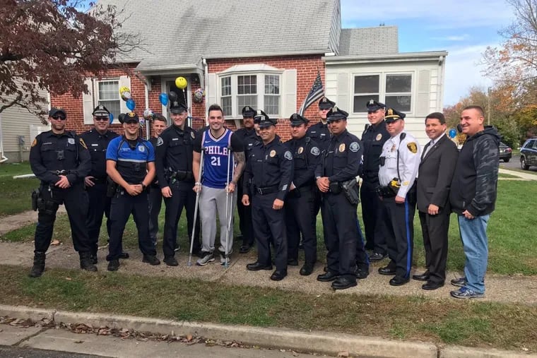 Camden County Police Officer Patrick O’Hanlon returned home Saturday afternoon surrounded by colleagues after being seriously injured Wednesday when a man he had been chasing allegedly shot him.