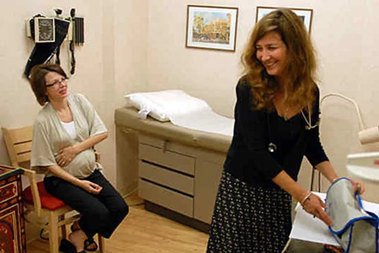 Amy McDonald, who is pregnant and taking Vitamin D supplements, sees her physician Daphne M. Goldberg in Bala Cynwyd. (Tom Gralish / Staff Photographer)