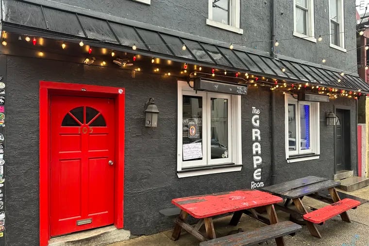 An outdoor photo of the Grape Room, which closed in March 2024 after nearly 40 years in Manayunk with ownership changes and location changes along the way.