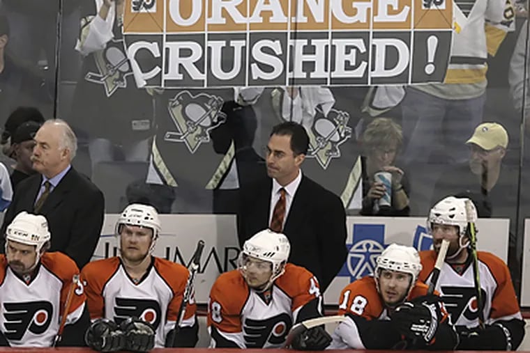 Flyers head coach John Stevens and his bench could only sit and watch the closing minutes of Pittsburgh's 6-0 Game 5 rout. (Ron Cortes/Inquirer)
