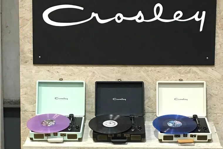 Urban Outfitters sells Crosley’s inexpensive luggage-style Cruiser portable record players along
with pricey vinyl LPs.