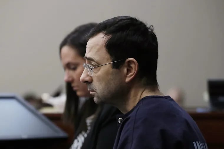 Dr. Larry Nassar is seated during the seventh day of his sentencing hearing Wednesday, Jan. 24, 2018, in Lansing, Mich. Nassar has admitted sexually assaulting athletes when he was employed by Michigan State University and USA Gymnastics, which is the sport's national governing organization and trains Olympians.