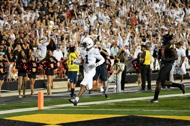 Penn State wide receiver KJ Hamler (1) scores a touchdown against Maryland.