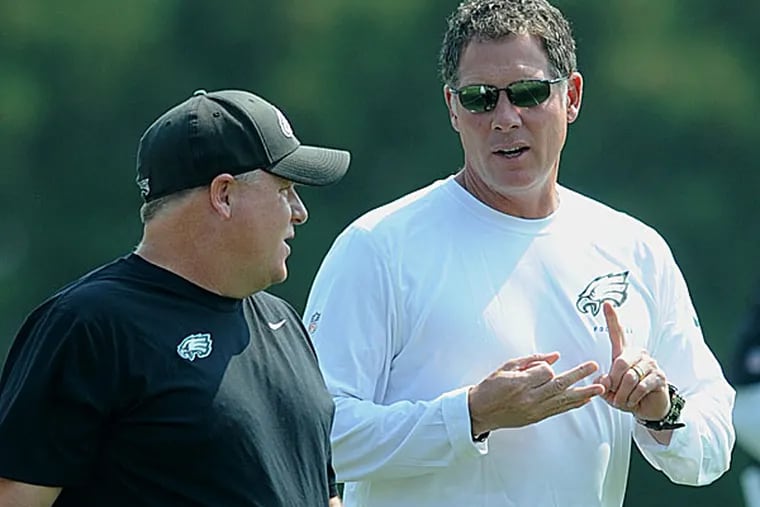 Eagles head coach Chip Kelly and offensive coordinator Pat Shurmur. (Clem Murray/Staff Photographer)