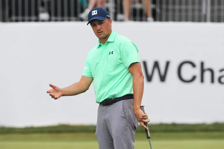 Jordan Spieth reacts to his putt on the 18th hole.