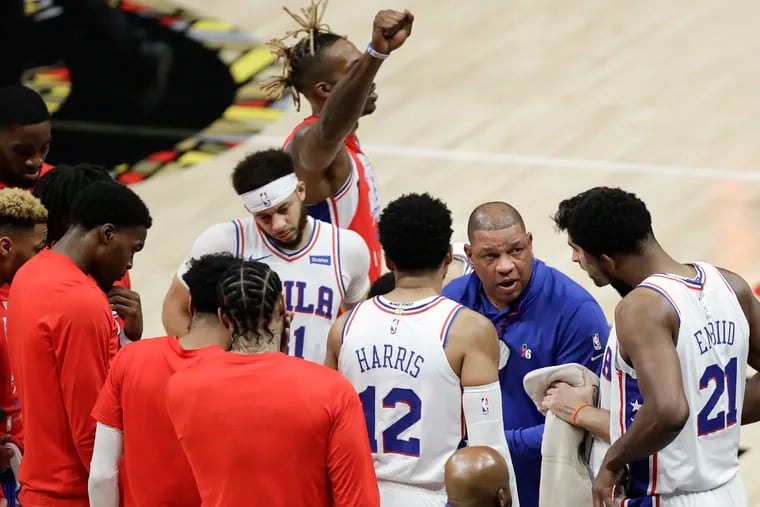 Sixers Head Coach Doc Rivers huddles with his players before the Sixers played the Atlanta Hawks in Game 4 of the NBA Eastern Conference playoff semifinals on Monday, June 14, 2021 in Atlanta.