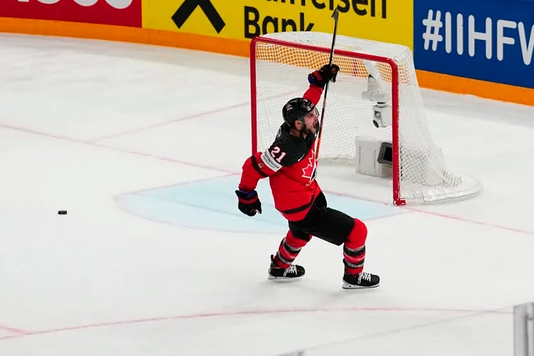 Flyers forward Scott Laughton celebrates after scoring the empty-netter that clinched Canada's gold medal at the 2023 IIHF Men's World Championships.