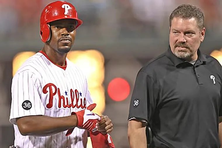 Jimmy Rollins' injury put a damper on the Phillies' victory. (Steven M. Falk / Staff Photographer)