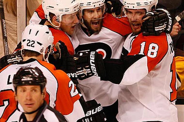 Simon Gagne's third-period goal capped off an historic comeback in Game 7. (David Maialetti / Staff Photographer)