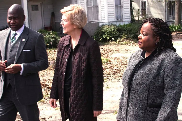 From left: Greenville, Miss., Mayor Errick Simmons, 2020 Democratic presidential candidate Sen. Elizabeth Warren and Mable Starks, former CEO of Mississippi Action for Community Education, tour Central Avenue from Poplar Street in Greenville, Miss., Monday  March 18, 2019. The group discussed dilapidated and affordable housing in the rural communities. (Bill Johnson / The Democrat-Times via AP)